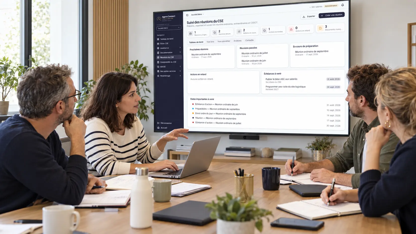 Des élus du CSE préparent leur réunion devant Agora Connect